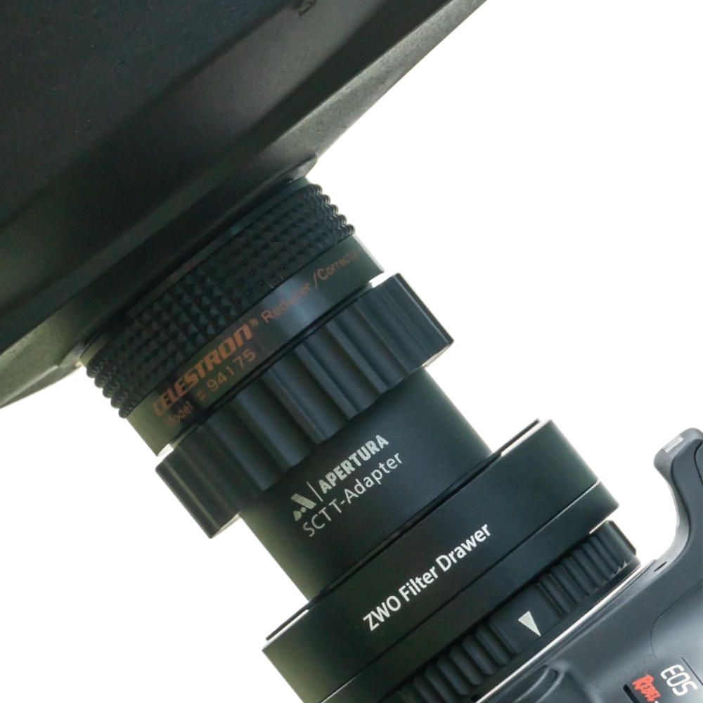 The Celestron f/6.3 Focal Reducer Corrector Installed on an SCT, with the Apertura Ultimate T-Adpater, a ZWO M42 filter drawer, and a Canon camera attached to it.