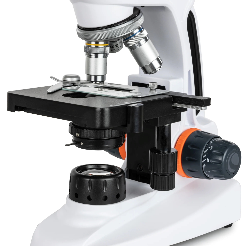 Close up of Celestron Labs Digital Wi-Fi Desktop Microscope showing optical 3 plan turret, mechanical stage, focuser, and LED