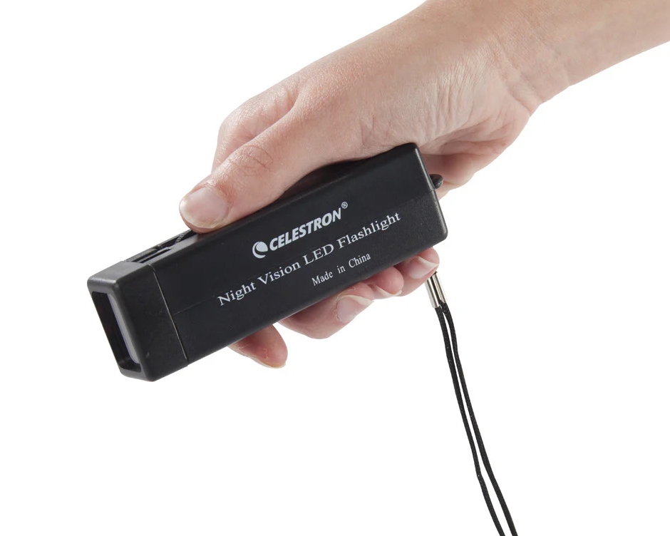 Celestron Night Vision Red Flashlight held by user