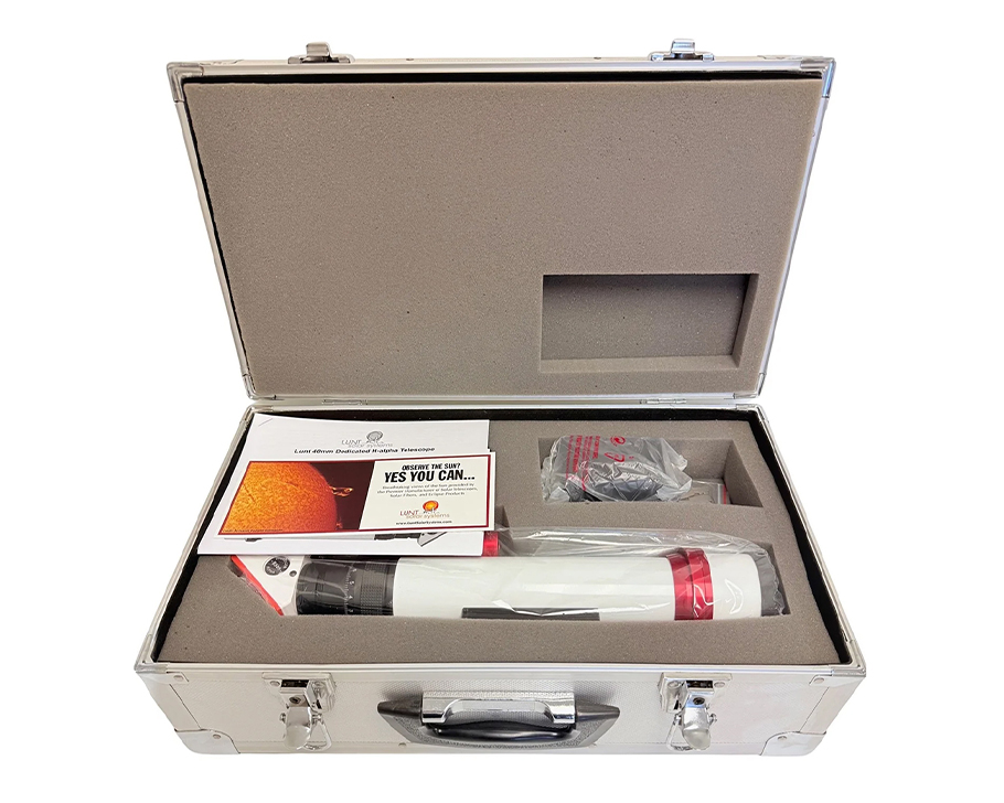 The Lunt 40 mm Ha Solar Telescope resting on hard case with accessories