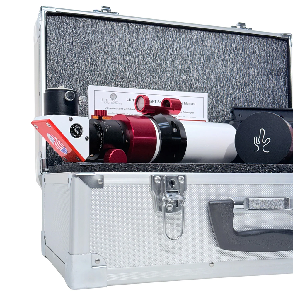 The Lunt 50 mm Ha Solar Telescope resting on hard case with accessories