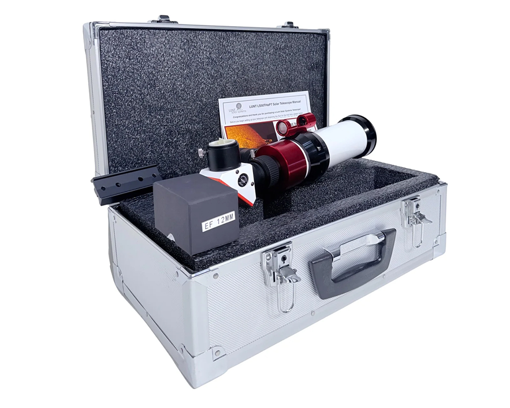 The Lunt 50 mm Ha Solar Telescope resting on hard case with accessories