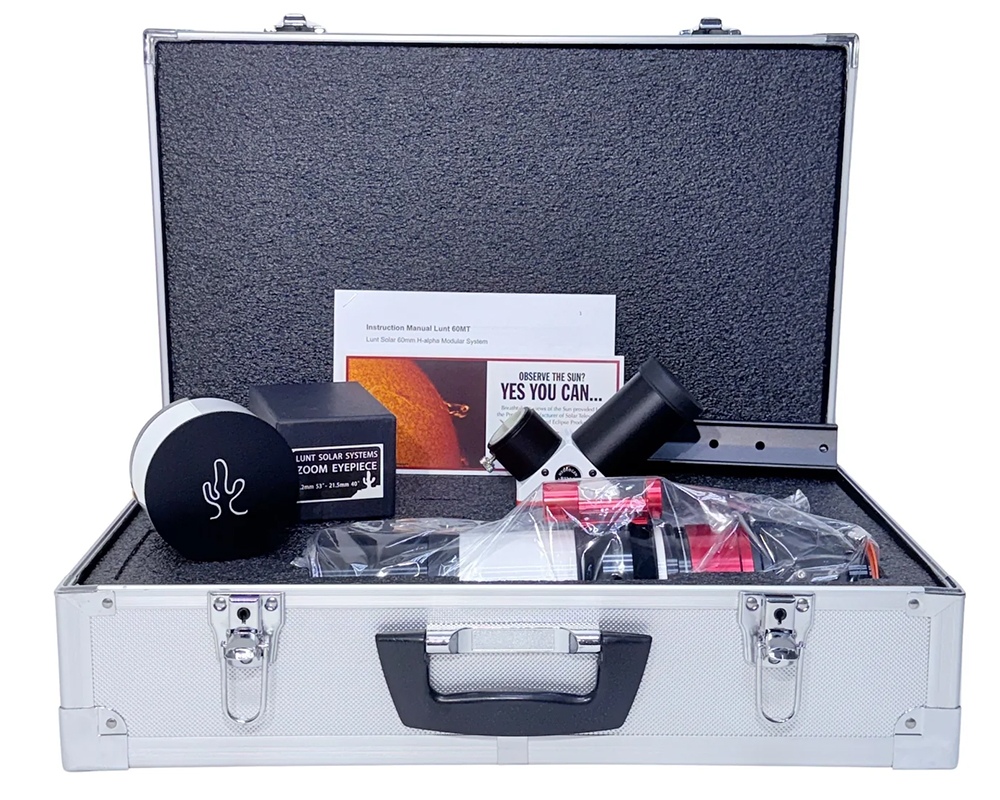 The Lunt 50 mm Ha Solar Telescope resting on hard case with accessories