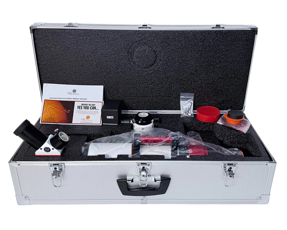 The Lunt 50 mm Ha Solar Telescope resting on hard case with accessories